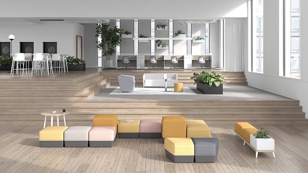 Mobilier de bureau Groupe Lacasse : fauteuils modulaires disposés dans un environnement de bureau moderne au Québec